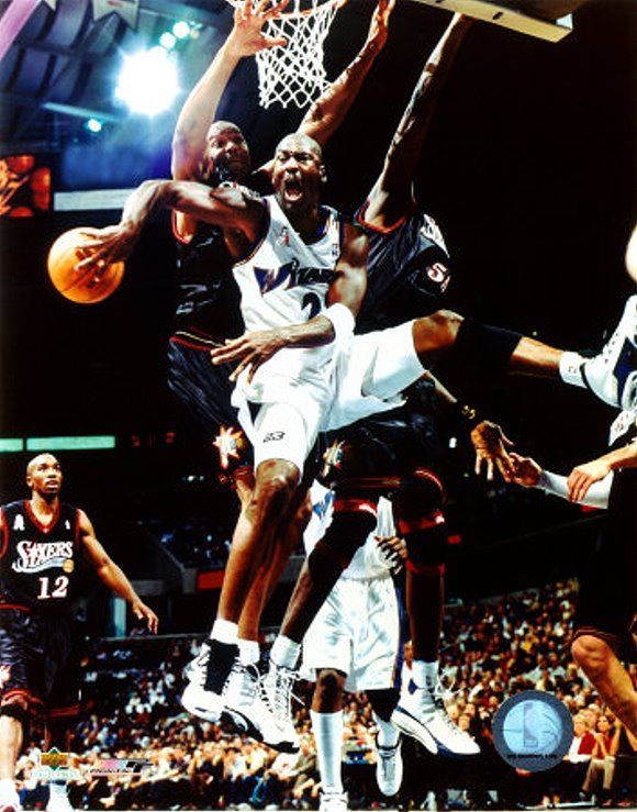 Michael Jordan Picture: with the Washington Wizards, passing the ball against the 76ers 7